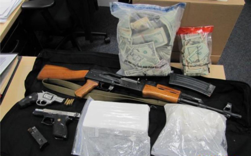 These items were seized from the Lancaster home of alleged gang member John Lawrence Robinson, authorities said. (Courtesy LASD)