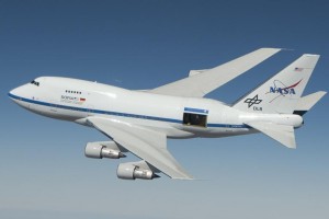 NASA's Stratospheric Observatory for Infrared Astronomy (SOFIA) is shown with its telescope door partly open during a test flight for its astronomical observation mission. (NASA / Jim Ross)