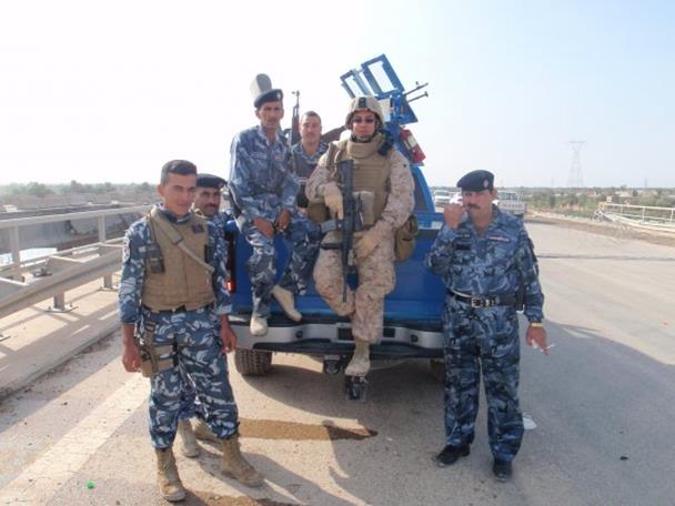 Valley resident and U.S. Marine Sergeant Carlos Ulloa with the Iraqi police force during 'Operation Iraqi Freedom.'