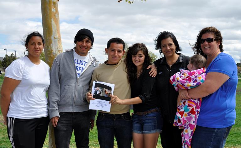 Jackie Perez (far right) and members of the Palmdale Youth Soccer League have led the movement to organize community support for the Valenzuela family.