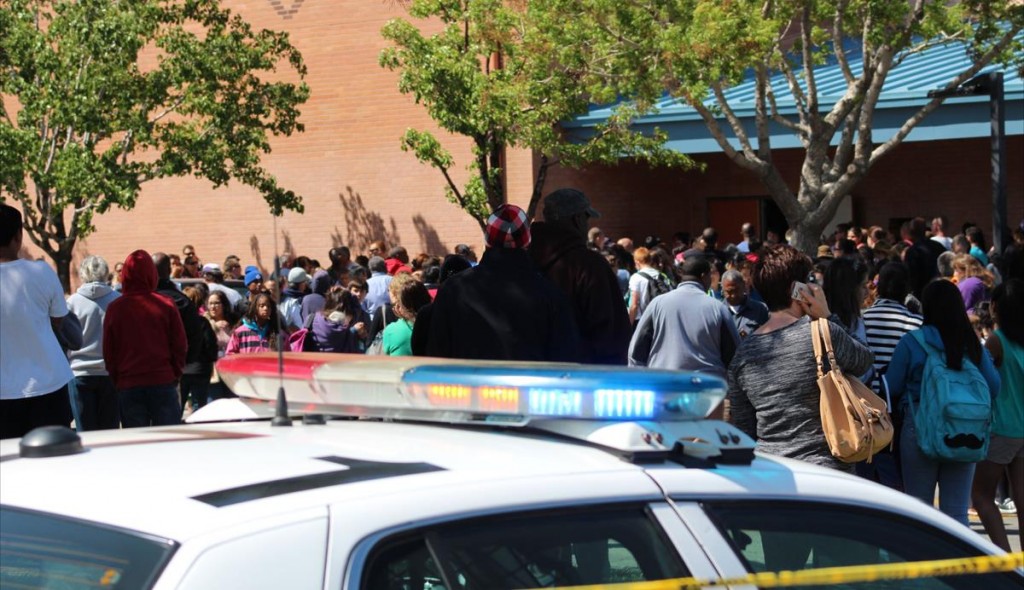 Frantic parents crammed the entrance of Hillview Middle School Monday afternoon as deputies stood guard. Deputies were searching for a 13-year-old student who was depresses and believed to be armed with his father's firearm. (Photos by TONY CHEVAL) 