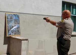 Deputy Michael Rust demonstrated the power of the new Tasers.